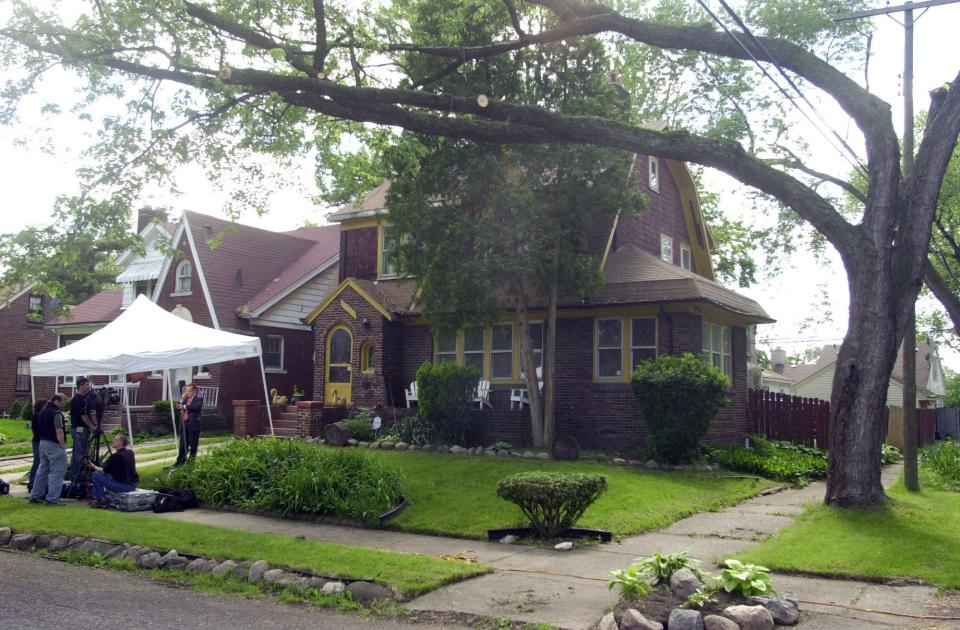 In this Friday, May 28, 2004 file photo, television crews set up camp outside a house in northwest Detroit, where investigators looking into the 1975 disappearance of Teamsters boss Jimmy Hoffa ripped up floor boards. The FBI has seen enough merit in a reputed Mafia captain's tip to once again break out the digging equipment to search for the remains of Hoffa, last seen alive before a lunch meeting with two mobsters nearly 40 years ago. Tony Zerilli told his lawyer that Hoffa was buried beneath a concrete slab in a barn in a field in suburban Detroit in 1975.