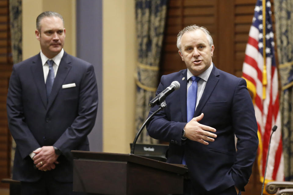 FILE - In this May 4, 2020, file photo, Oklahoma House Speaker Charles McCall, left, R-Atoka, looks on as Senate President Pro Tempore Greg Treat, right, R-Oklahoma City, answers a question at a news conference in Oklahoma City. Oklahoma House and Senate leaders on Friday, Jan. 29, 2021, announced safety protocols for the upcoming legislative session that include encouraging, but not requiring, lawmakers wear masks when at the state Capitol. (AP Photo/Sue Ogrocki, File)