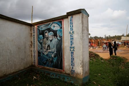 A sign is seen outside an Ebola transit centre in the town of Katwa, near Butembo