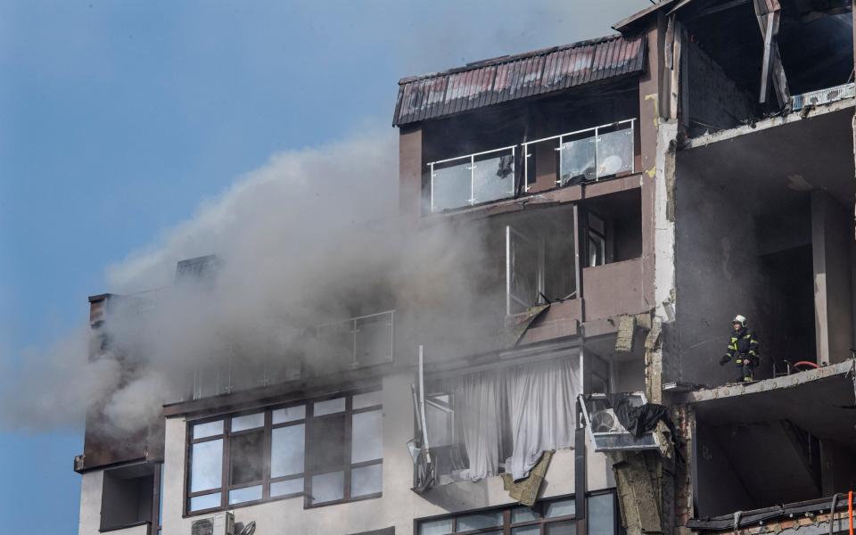  A residential block next to the Artem plant in the Shevchenski District in Kyiv with was hit by a Russian cruise missile early on Sunday morning - JULIAN SIMMONDS/The Daily Telegraph