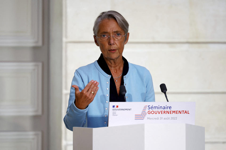 FILE - French Prime Minister Elisabeth Borne delivers a statement following a weekly cabinet meeting and a government seminar at the Elysee Palace in Paris, Wednesday, Aug. 31, 2022. Italy’s European Union partners are signaling discomfort and vigilance after one of the bloc’s founding members swung far to the political right, raising troubling questions about whether Rome will maintain its commitments to EU principles, laws and ambitions. The French prime minister on Monday, Sept. 26, 2022 said that France, along with EU officials, would be watching closely to ensure that basic human rights rights along with access to abortion, are guaranteed in Italy after Giorgia Meloni’s neo-fascist Brother’s of Italy Party topped the vote count in Sunday’s parliamentary election. (Sarah Meyssonnier/Pool via AP, File)