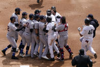 Chicago White Sox and Cleveland Indians benches clear after a pushing incident at second base during the first inning of a baseball game in Chicago, Thursday, April 15, 2021. (AP Photo/Nam Y. Huh)