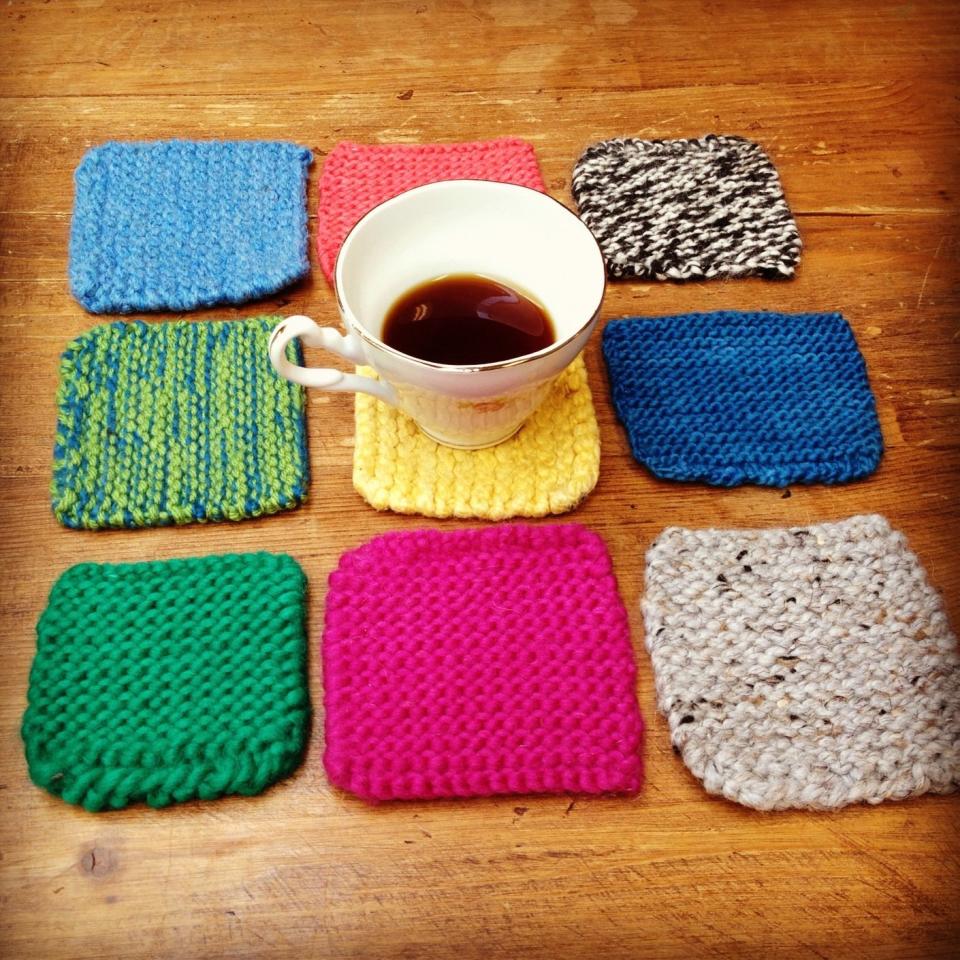 Practice knitting squares make for a perfect <a href="http://www.huffingtonpost.com/2012/11/27/homemade-gift-ideas-knitted-coasters_n_2198645.html?utm_hp_ref=huffpost-home&ir=HuffPost%20Home">set of coasters</a>.