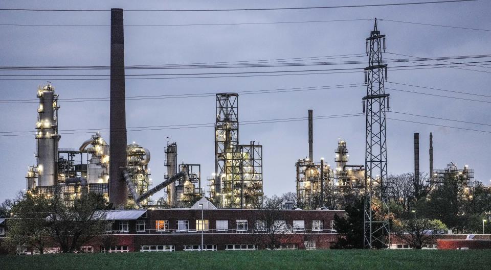 FILE - A Shell chemical plant is illuminated in Wesseling, near Cologne, Germany, on April 6, 2022. Germany says it’s making progress on weaning itself off Russian fossil fuels and expects to be fully independent of crude oil imports from Russia by late summer. Economy and Climate Minister Robert Habeck on Sunday said Europe’s biggest economy has reduced the share of Russian imports in its energy consumption to 12 percent for oil, 8 percent for coal and 35 percent for natural gas. (AP Photo/Martin Meissner, File)