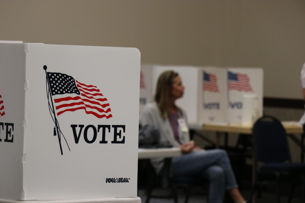 Poll workers wait at the Dixie Convention Center, one of the in-person voting locations available in Washington County. Most votes are cast by mail in southwestern Utah, including for the municipal races up for election in 2023.