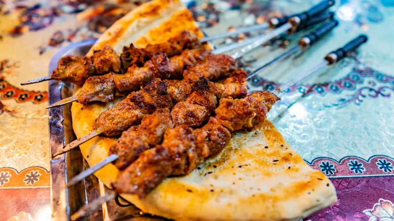 Uyghur lamb skewers with bread