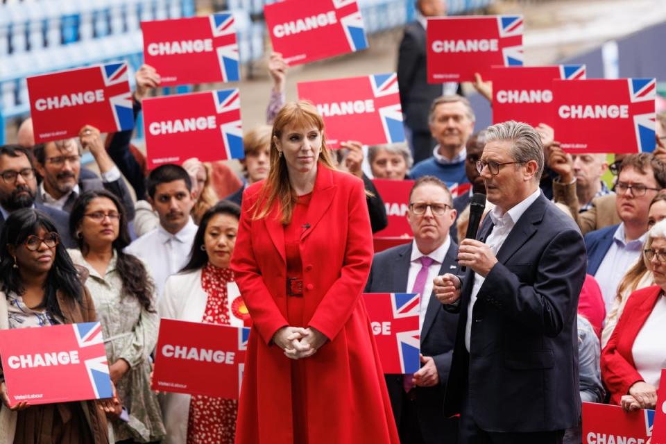 Angela Rayner and Keir Starmer speak to the media on the first day of the 2024 general election campaign (Getty)