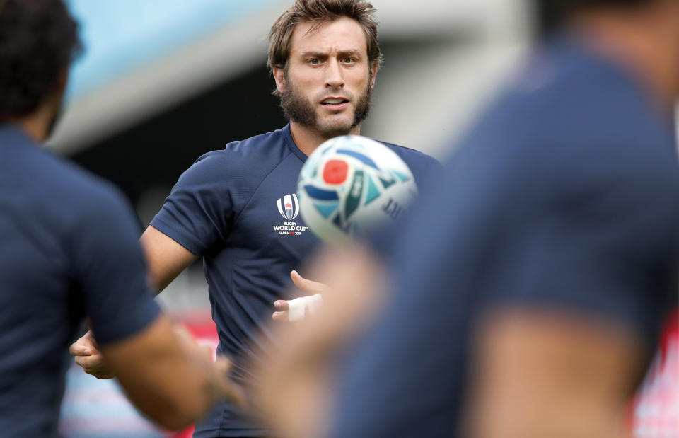 France's Maxime Medard passes the ball during a training session in Tokyo, Japan, Thursday, Sept. 19, 2019. The Rugby World Cup starts Friday, Sept. 20, with Japan playing Russia, and ends with the final on Nov. 2. (AP Photo/Christophe Ena)