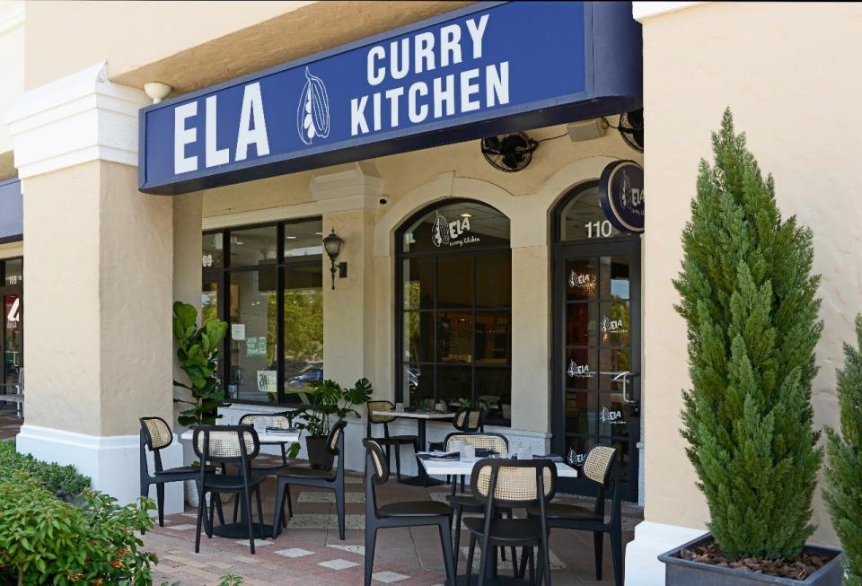 Ela Curry Kitchen offers al fresco dining as well as indoor seating in the dining room and bar.