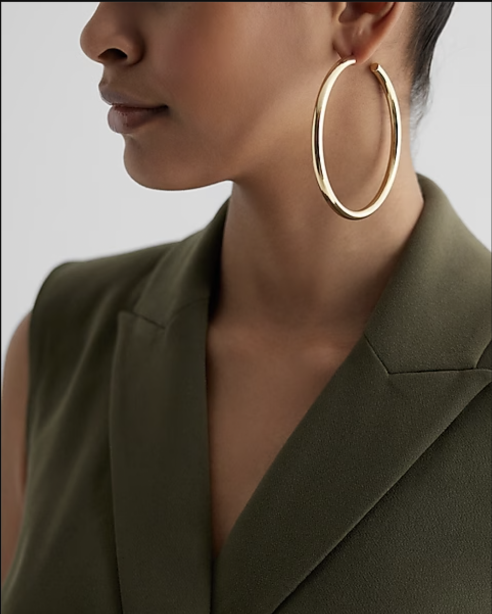 <p><a href="https://go.redirectingat.com?id=74968X1596630&url=https%3A%2F%2Fwww.express.com%2Fclothing%2Fwomen%2Flarge-tube-hoop-earrings%2Fpro%2F00763391%2Fcolor%2FShiny%2520Gold%2F&sref=https%3A%2F%2Fwww.cosmopolitan.com%2Fstyle-beauty%2Ffashion%2Fg46343617%2Fbest-everyday-hoop-earrings%2F" rel="nofollow noopener" target="_blank" data-ylk="slk:Shop Now;elm:context_link;itc:0;sec:content-canvas" class="link ">Shop Now</a></p><p>Large Tube Hoop Earrings</p><p>$30.00</p>