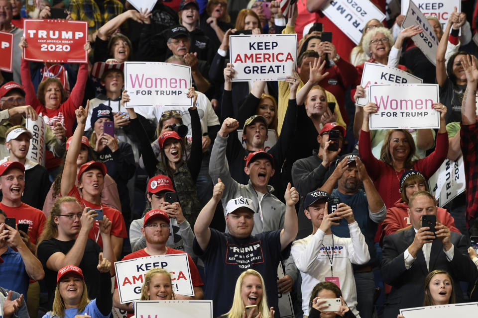 People in the crowd react as President Donald Trump speaks at a campaign rally in, Lexington, Ky., Monday, Nov. 4, 2019. (AP Photo/Susan Walsh)