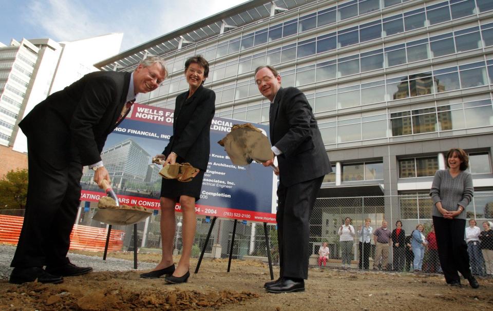 Des Moines Mayor Frank Cownie, Lt. Gov. Sally Pedersen and Tom Shippee, Wells Fargo Financial president and CEO at the groundbreaking ceremony for Wells Fargo Financial's new 9-story building downtown at 801 Walnut St. in Des Moines in 2004.