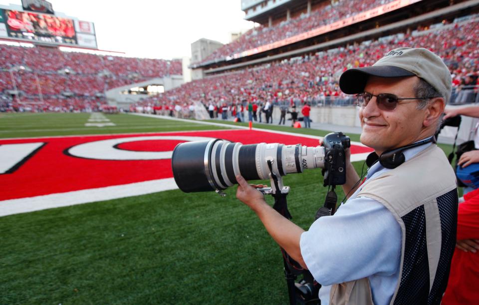 Columbus Dispatch photographer Fred Squillante covers the Ohio State against Iowa football game 11-15-09.