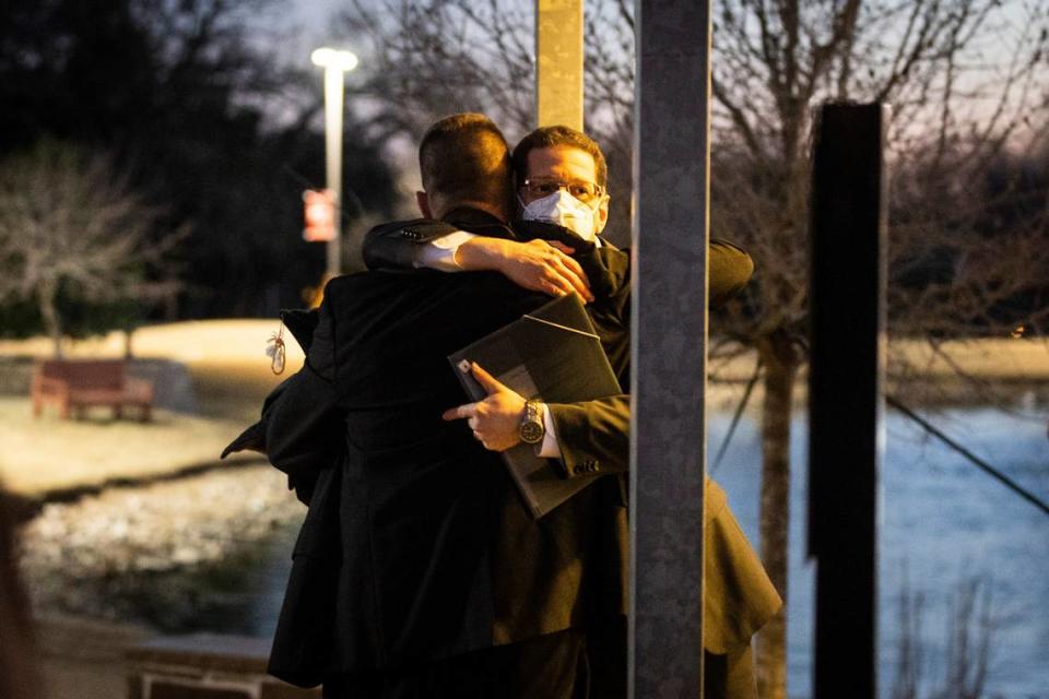 Congregation Beth Israel Rabbi Charlie Cytron-Walker (facing camera) hugs a man after a healing service Monday night, Jan. 17, 2022, at White’s Chapel United Methodist Church in Southlake. Cytron-Walker was one of four people held hostage by a gunman at his Colleyville, Texas, synagogue on Saturday.