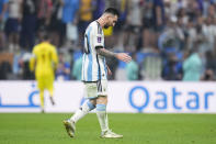 Argentina's Lionel Messi walks on the field during the World Cup final soccer match between Argentina and France at the Lusail Stadium in Lusail, Qatar, Sunday, Dec.18, 2022. (AP Photo/Manu Fernandez)