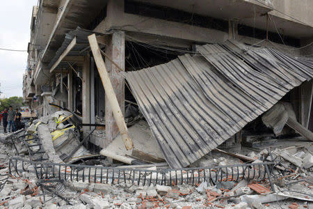 Damage is seen after an explosion in the al-Zahraa neighbourhood of Homs city in this handout picture provided by SANA on May 23, 2017, Syria. SANA/Handout via REUTERS