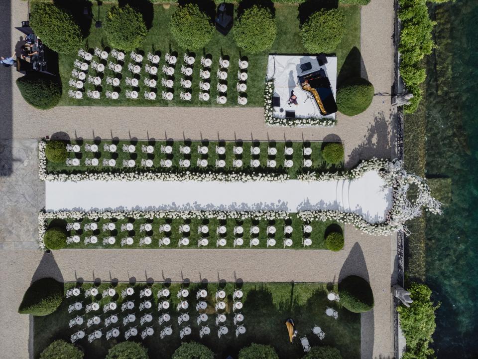 Giorgia Gabriele Wore a Custom Off-White Wedding Dress With a 26-Foot Train to Her Ceremony on Lake Como