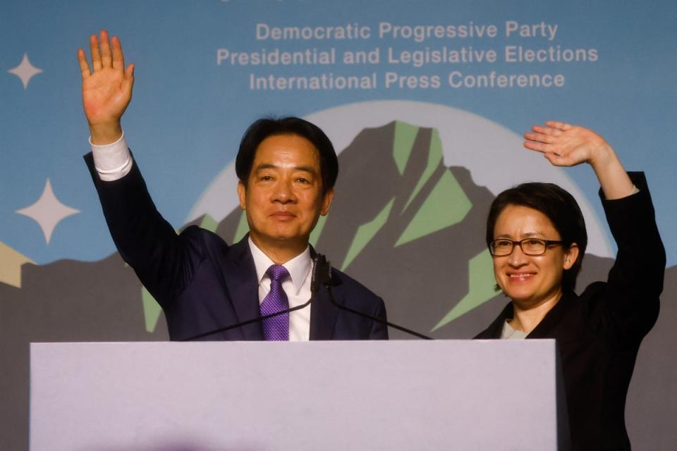 Taiwan President-elect Lai Ching-te, of Democratic Progressive Party's (DPP) and his running mate Hsiao Bi-khim wave as they hold a press conference (REUTERS)