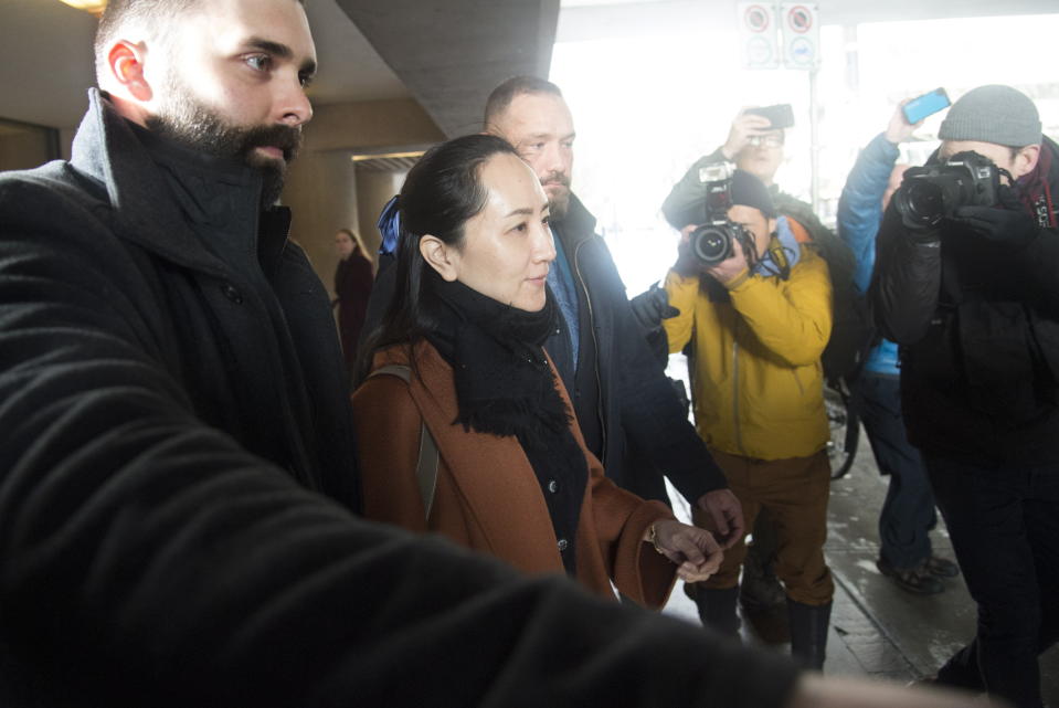 Huawei chief financial officer Meng Wanzhou, who is out on bail and remains under partial house arrest after she was detained last year at the behest of American authorities, leaves B.C. Supreme Court following a case management hearing, Friday, Jan. 17, 2020, in Vancouver, British Columbia. (Jonathan Hayward/The Canadian Press via AP)