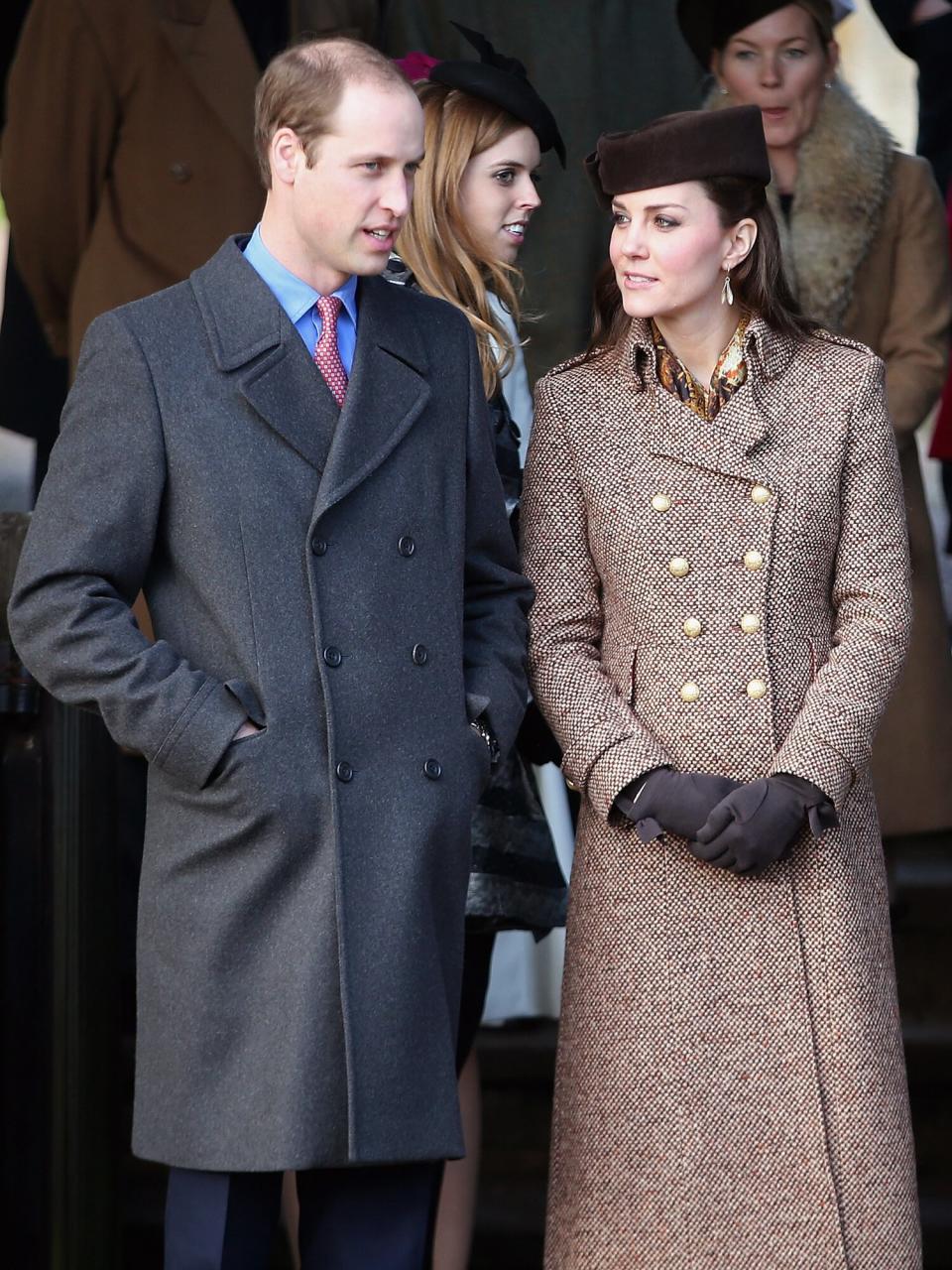 Prince William, Duke of Cambridge and Catherine, Duchess of Cambridge leave the Christmas Day Service at Sandringham Church on December 25, 2014 in King's Lynn, England