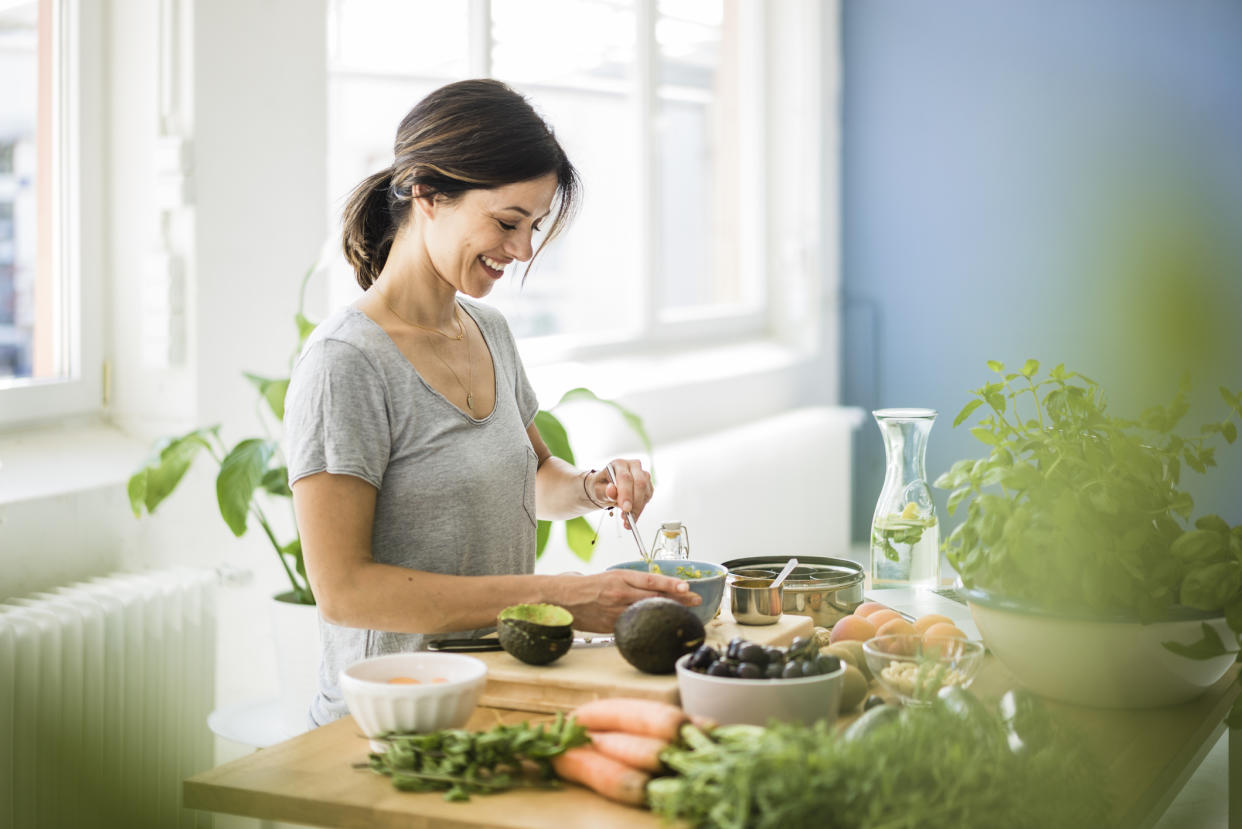 Woman prepping a healthy meal. (Getty Images)