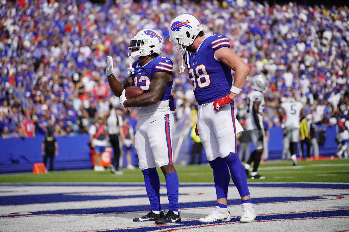 Damien Harris, left, and Dawson Knox celebrate his touchdown in the Bills’ game against the Raiders on Sept. 17, 2023. Gregory Fisher/USA TODAY NETWORK