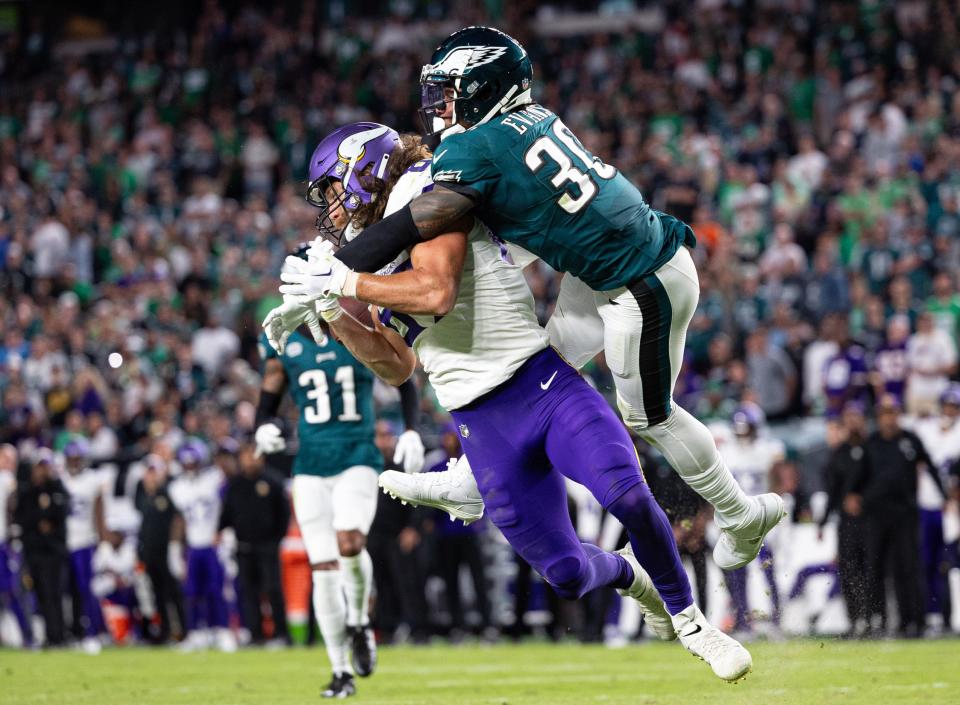 Sep 14, 2023; Philadelphia, Pennsylvania, USA; Philadelphia Eagles safety Justin Evans (30) breaks up a pass to Minnesota Vikings tight end T.J. Hockenson (87) during the fourth quarter at Lincoln Financial Field. Mandatory Credit: Bill Streicher-USA TODAY Sports