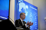 Richard Moore, the Chief of Britain's Secret Intelligence Service, also known as MI6, answers questions after giving his first public speech since becoming head of the organisation, at the International Institute for Strategic Studies, in London, Tuesday, Nov. 30, 2021. China, Russia and Iran pose three of the biggest threats to the U.K. in a fast-changing, unstable world, the head of Britain's foreign intelligence agency said Tuesday. (AP Photo/Matt Dunham)