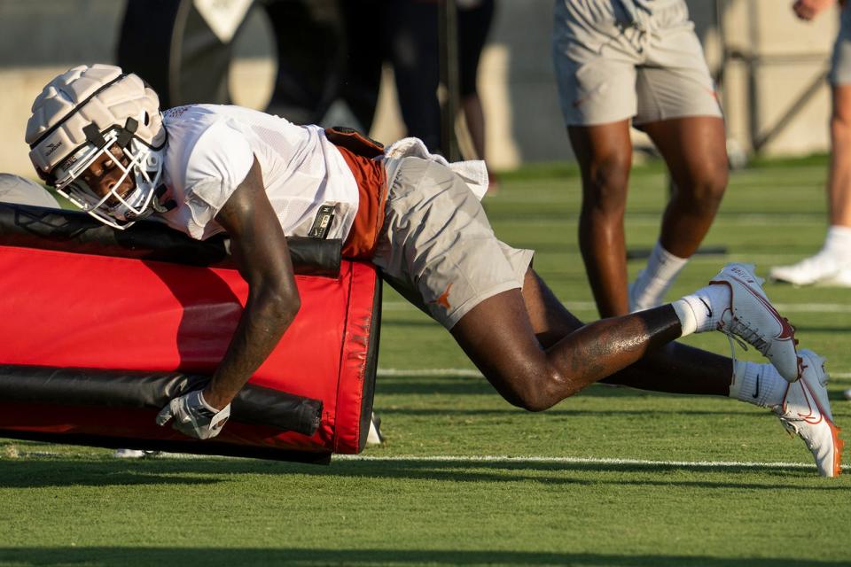Texas safety Derek Williams Jr. runs through drills during a summer practice. Williams has been one of the most impactful freshmen with a dozen tackles.