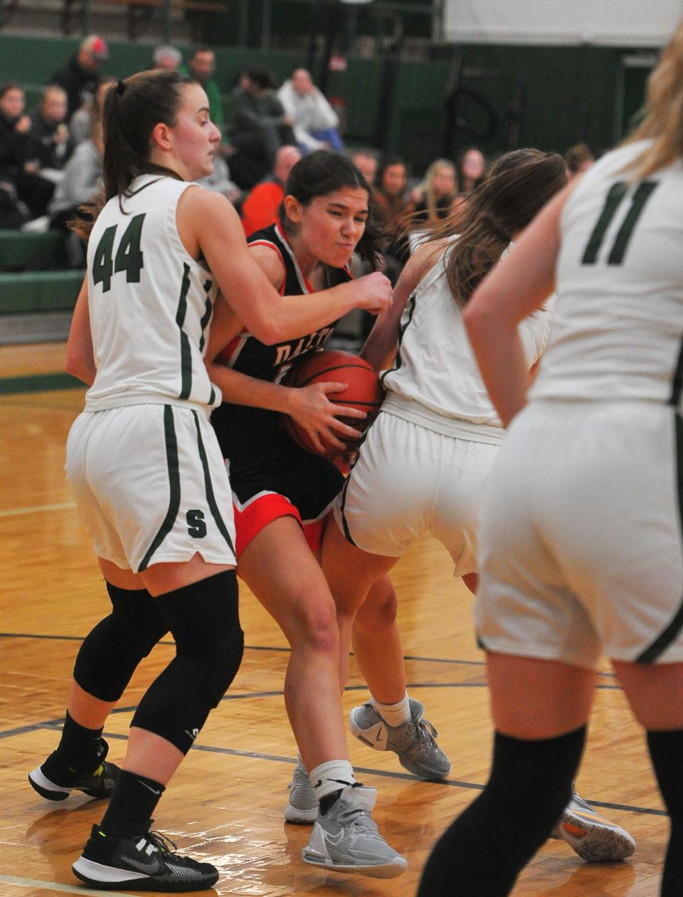 Dalton's Ella Lunsford drives against Smithville's Cammi Wickens.