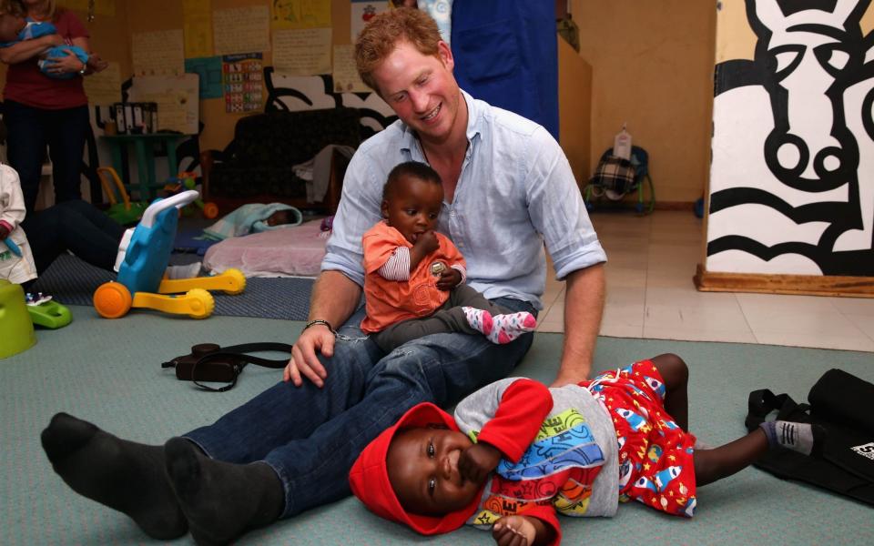 Prince Harry during a visit to Sentebale in 2014 - ITV