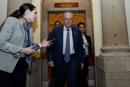 U.S. Senate Minority Leader Chuck Schumer (D-NY) walks past reporters outside House Speaker Nancy Pelosi's office as he departs following a meeting between Congressional leaders and Trump administration representatives on Capitol Hill in Washington, U.S., May 21, 2019. REUTERS/Kevin Lamarque