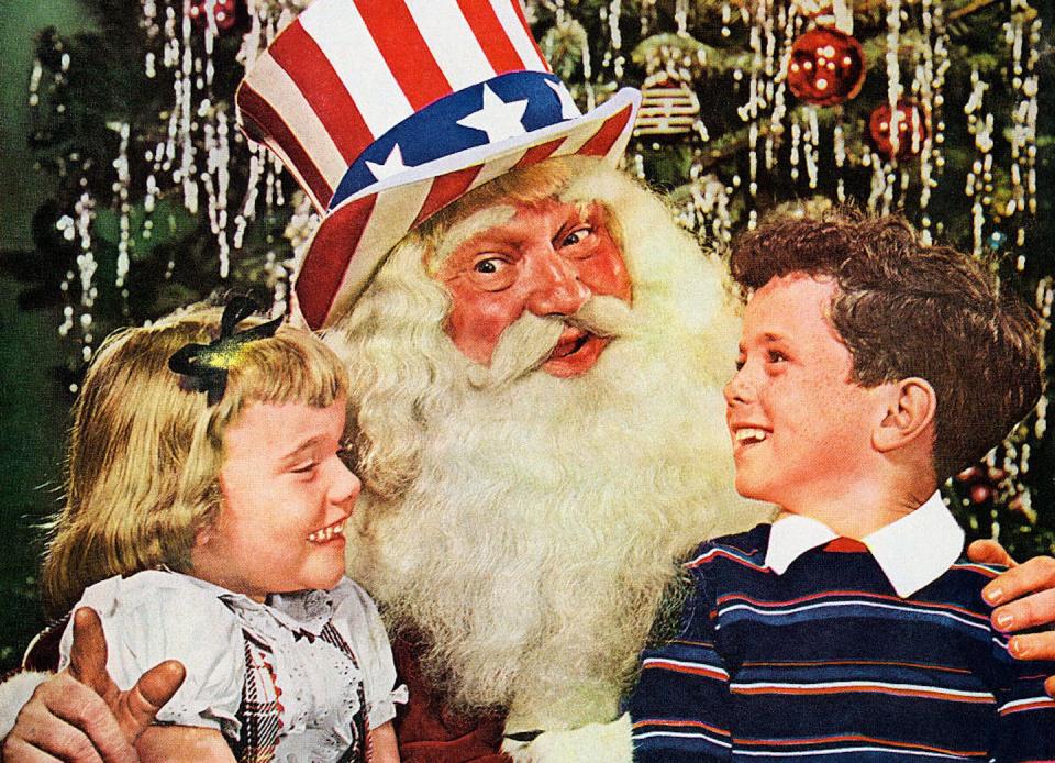 During World War II, aspects of the Christmas holiday – family, home, comfort and safety – took on greater meaning. <a href="https://www.gettyimages.com/detail/news-photo/retro-santa-claus-wearing-a-stars-and-stripes-tophat-with-a-news-photo/525363617?adppopup=true" rel="nofollow noopener" target="_blank" data-ylk="slk:GraphicaArtis/Getty Images;elm:context_link;itc:0;sec:content-canvas" class="link ">GraphicaArtis/Getty Images</a>