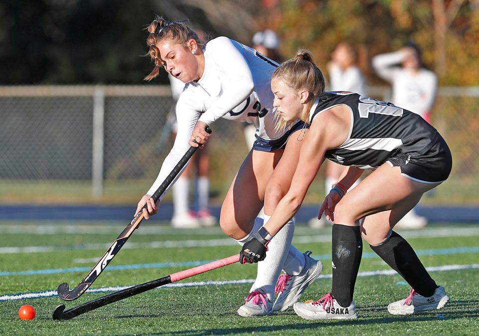 Kate Greer of Cohasset takes a shot past Cassidy Leger of Bellingham.
Cohasset hosted Bellingham in the first round of the MIAA girls field hockey tournament on Thursday, Nov. 2, 2023