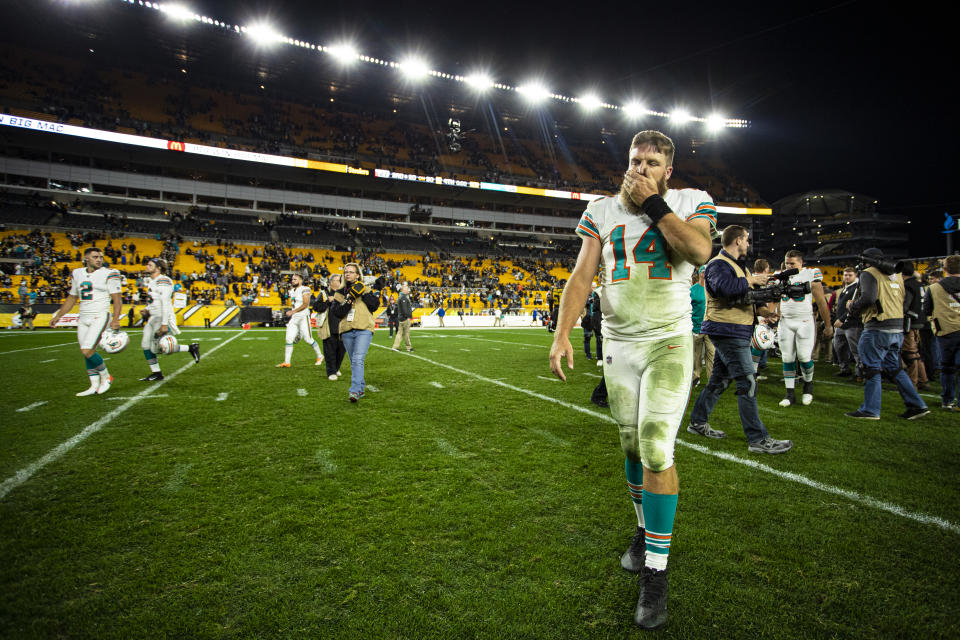 PITTSBURGH, PA - OCTOBER 28: Miami Dolphins quarterback Ryan Fitzpatrick (14) walks off the fields after the NFL football game between the Miami Dolphins and the Pittsburgh Steelers on October 28, 2019 at Heinz Field in Pittsburgh, PA. (Photo by Mark Alberti/Icon Sportswire via Getty Images)