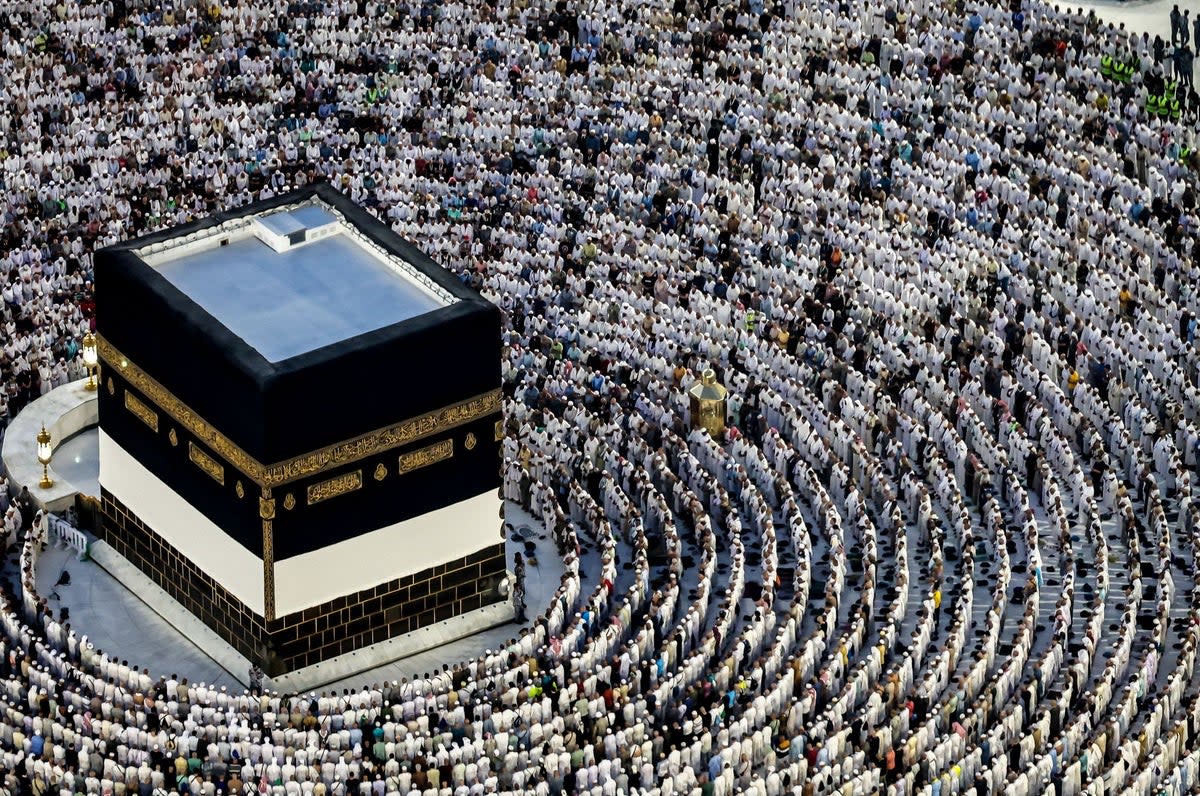 Muslim pilgrims pray around the Kaaba, Islam's holiest shrine, at the Grand Mosque in the holy city of Mecca, Saudi Arabia (AFP via Getty Images)