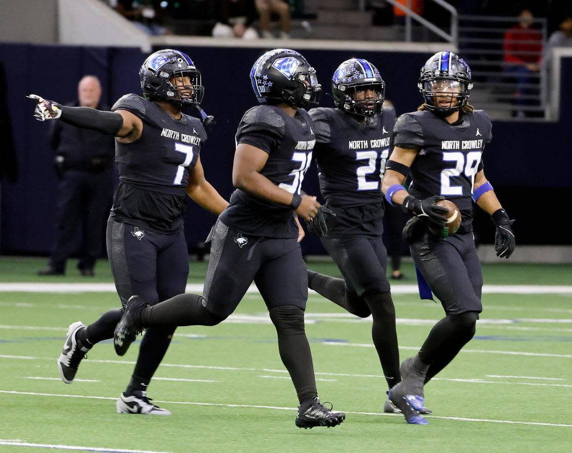 North Crowley linebacker Keith Hodge (29) comes out of the pile with a turnover in the first half of a UIL Class 6A Division 1 football regional-round playoff game at The Ford Center in Frisco, Texas, Saturday, Oct. 25, 2023.