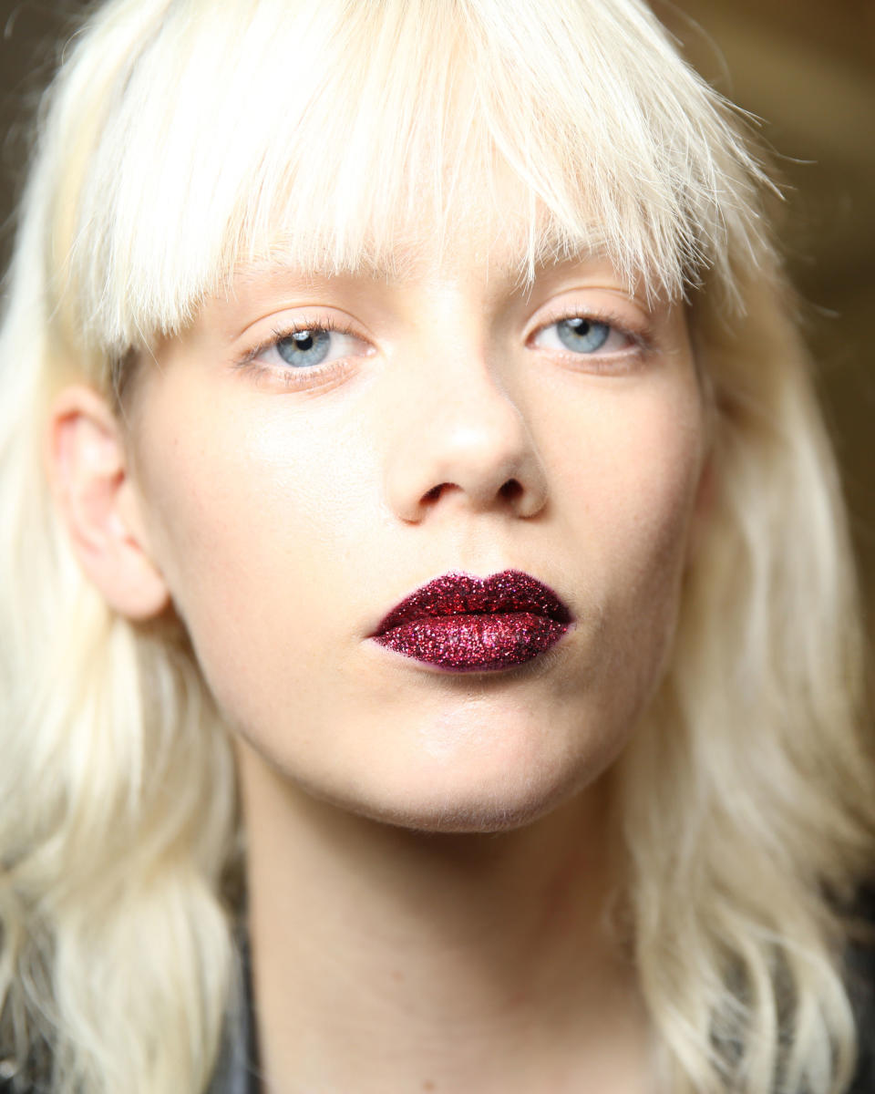 <p>When in doubt red glitter lips add instant 'party' to any outfit.</p>