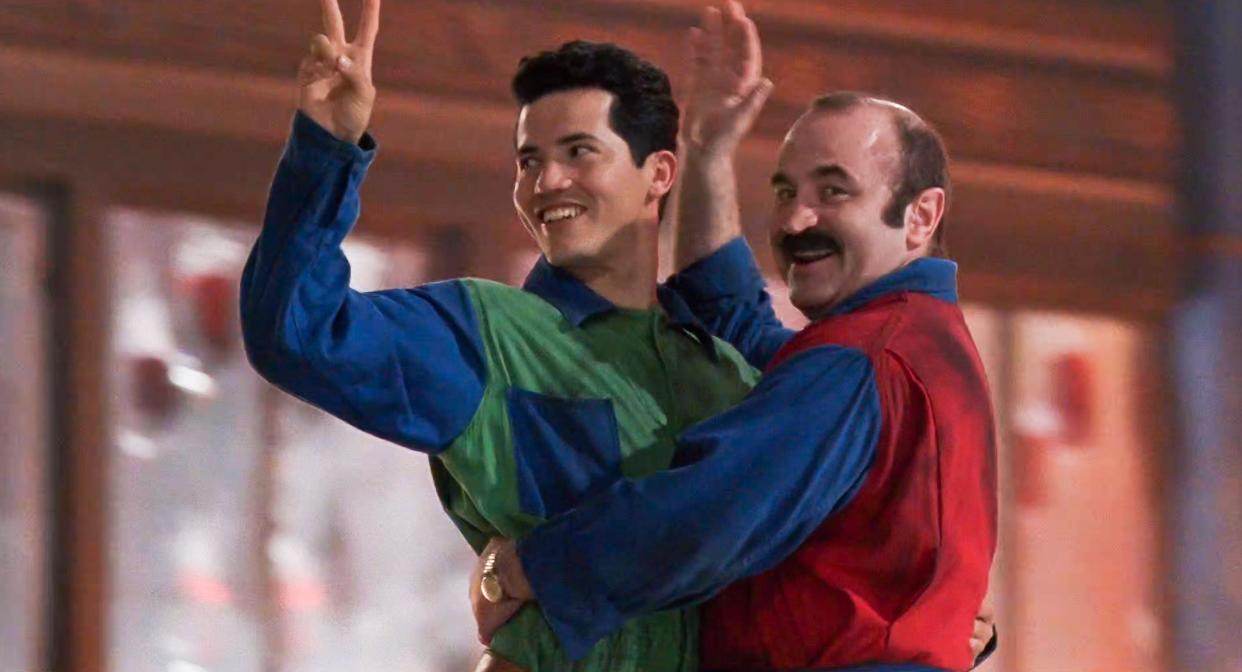 USA.  Bob Hoskins and John Leguizamo in a scene from the (C)Buena Vista Pictures  film :Super Mario Bros. (1993) Plot: Two Brooklyn plumbers, Mario and Luigi, must travel to another dimension to rescue a princess from the evil dictator King Koopa and stop him from taking over the world.  Ref:  LMK110-J8461-141022 Supplied by LMKMEDIA. Editorial Only. Landmark Media is not the copyright owner of these Film or TV stills but provides a service only for recognised Media outlets. pictures@lmkmedia.com