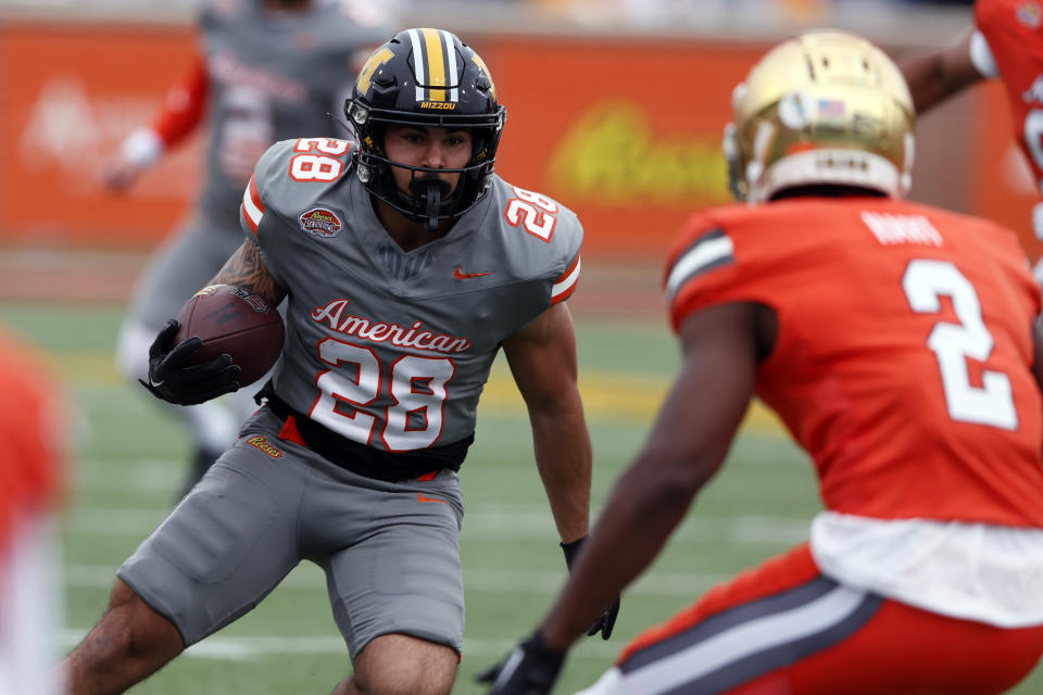 American running back Cody Schrader of Missouri (28) carries the ball during the first half of the Senior Bowl NCAA college football game, Saturday, Feb. 3, 2024, in Mobile, Ala. (AP Photo/ Butch Dill)