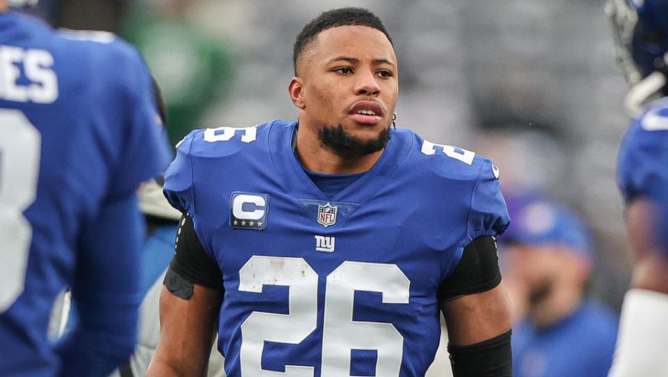 Dec 11, 2022;  East Rutherford, New Jersey, USA;  New York Giants running back Saquon Barkley (26) warms up before the game against the Philadelphia Eagles at MetLife Stadium.