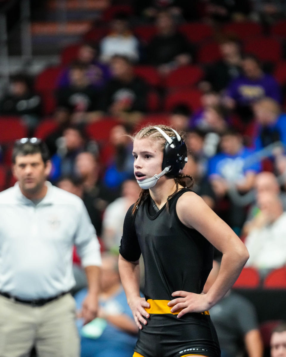 Sigourney-Keota’s Reanah Utterback, waits to wrestle Clayton Ridge’s Erik Flores at 106 pounds during the second round of the Class 1A of the Iowa high school state wrestling tournament at Wells Fargo Arena in Des Moines on Wednesday, Feb. 15, 2023.