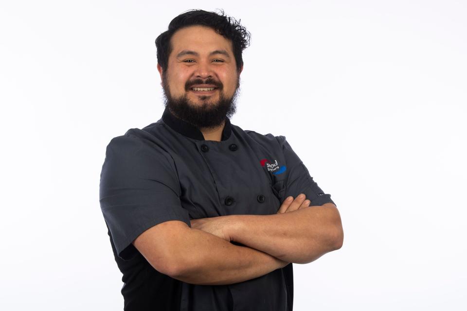 Chef Josh Coates, of Seoul Brothers, poses for a portrait in the Knox News photo studio in Knoxville, Tenn., on Wednesday, Dec. 14, 2022.