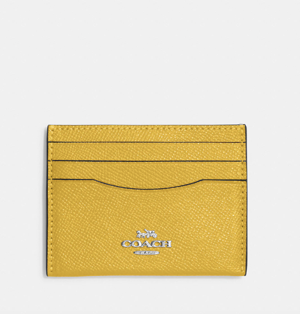 Slim ID Card Case in canary yellow (photo via Coach Outlet)