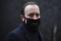 Britain's Health Secretary Matt Hancock wears a face mask as he leaves 10 Downing Street, in London, Wednesday, Feb. 3, 2021. Hancock said Wednesday a new study suggesting that a single dose of the AstraZeneca vaccine may reduce transmission of COVID-19 categorically supports the government’s strategy of taking more time between injections.(AP Photo/Alberto Pezzali)