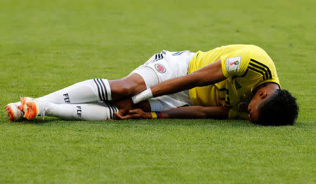 Soccer Football - World Cup - Group H - Senegal vs Colombia - Samara Arena, Samara, Russia - June 28, 2018 Colombia's Johan Mojica goes down after sustaining an injury REUTERS/Carlos Garcia Rawlins