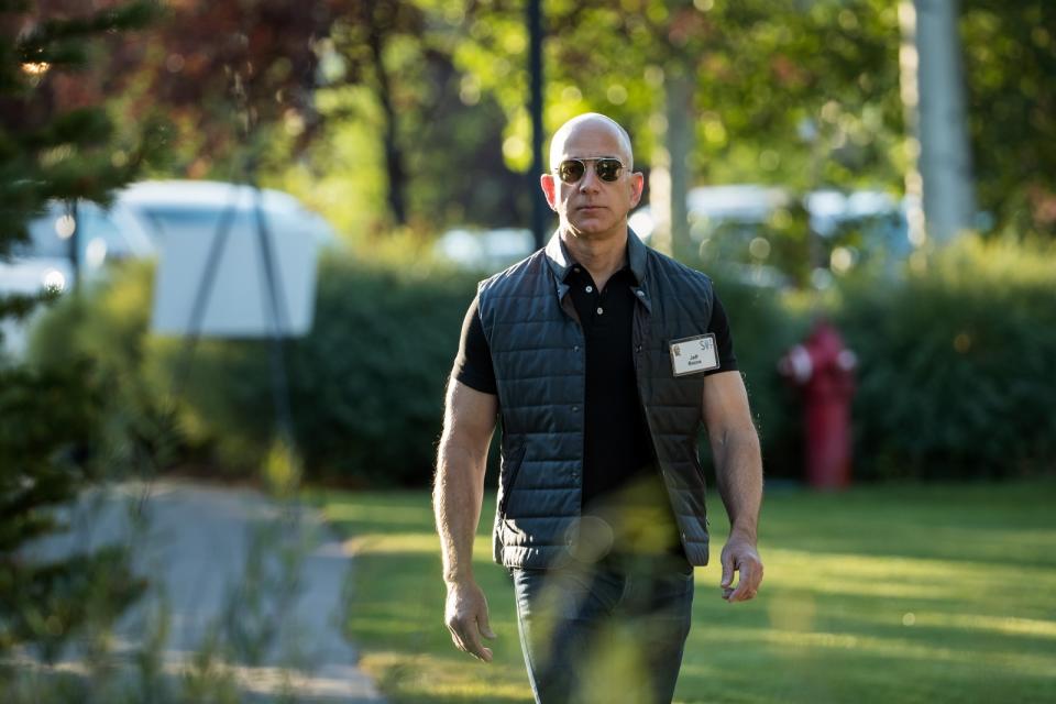 Amazon CEO Jeff Bezos, all business into earnings.