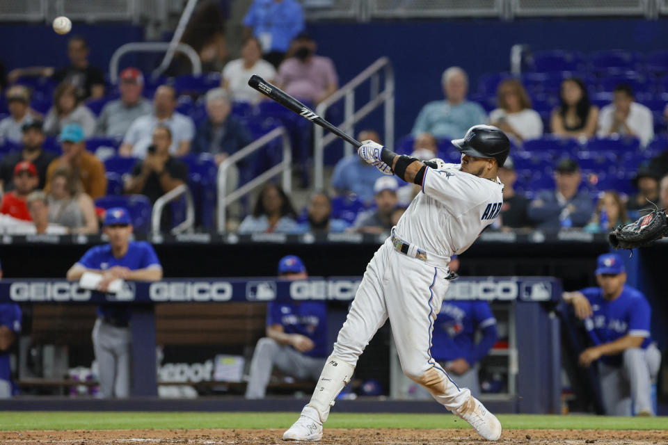 Marlins second baseman Luis Arraez hits a single against the Blue Jays on Monday, one of his five hits in Miami's victory.