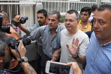 FILE PHOTO: U.S. pastor Andrew Brunson reacts as he arrives at his home after being released from the prison in Izmir, Turkey July 25, 2018. Picture taken July 25, 2018. Demiroren News Agency/DHA via REUTERS/File photo