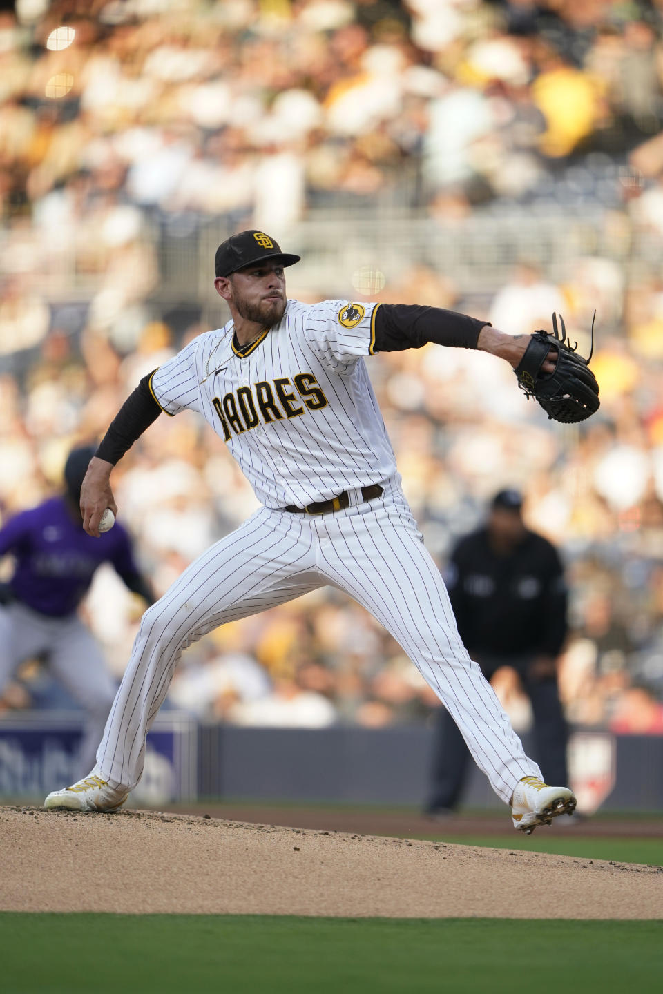 San Diego Padres starting pitcher Joe Musgrove works against a Colorado Rockies batter during the first inning of a baseball game Friday, June 10, 2022, in San Diego. (AP Photo/Gregory Bull)